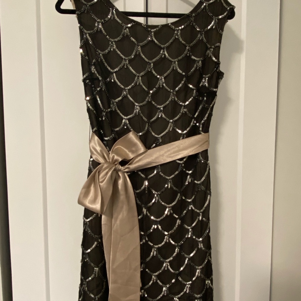 A cocktail dress. Not brand new but have worn a few times.